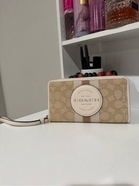 COACH Beige Signature Stripe Zip Wristlet